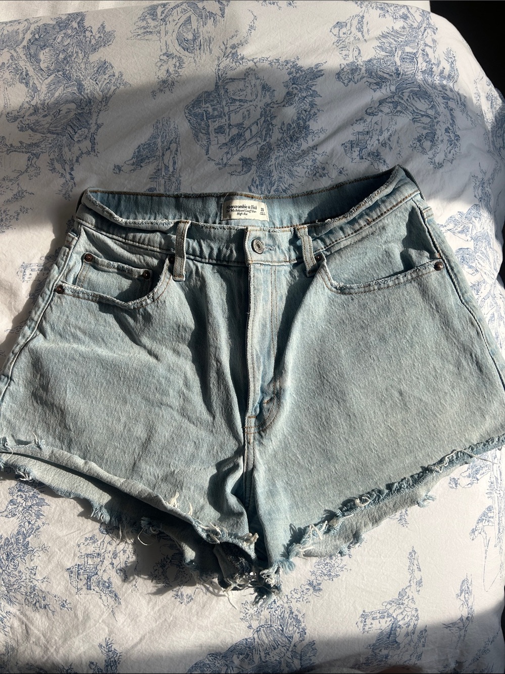 Abercrombie High Rise 90s cutoff shorts (light blue wash)